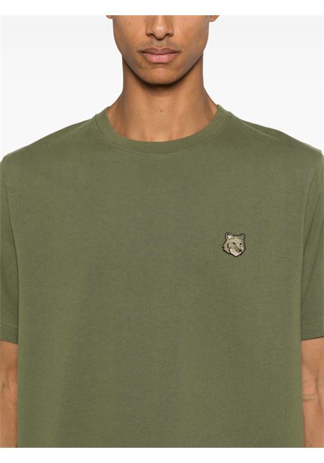 T-shirt con applicazione Bold Fox Head in verde Maison kitsuné - uomo MAISON KITSUNÉ | MM00127KJ0118P384